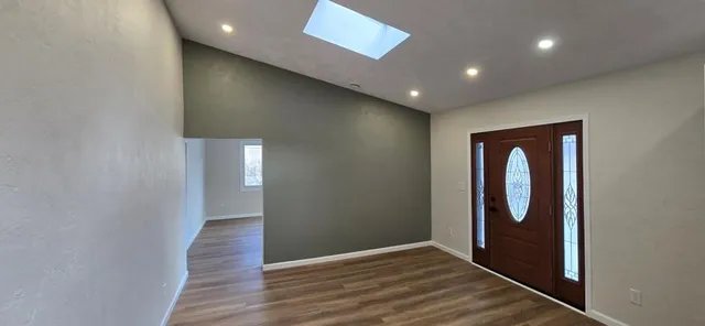 an entryway in a hall hall with a door