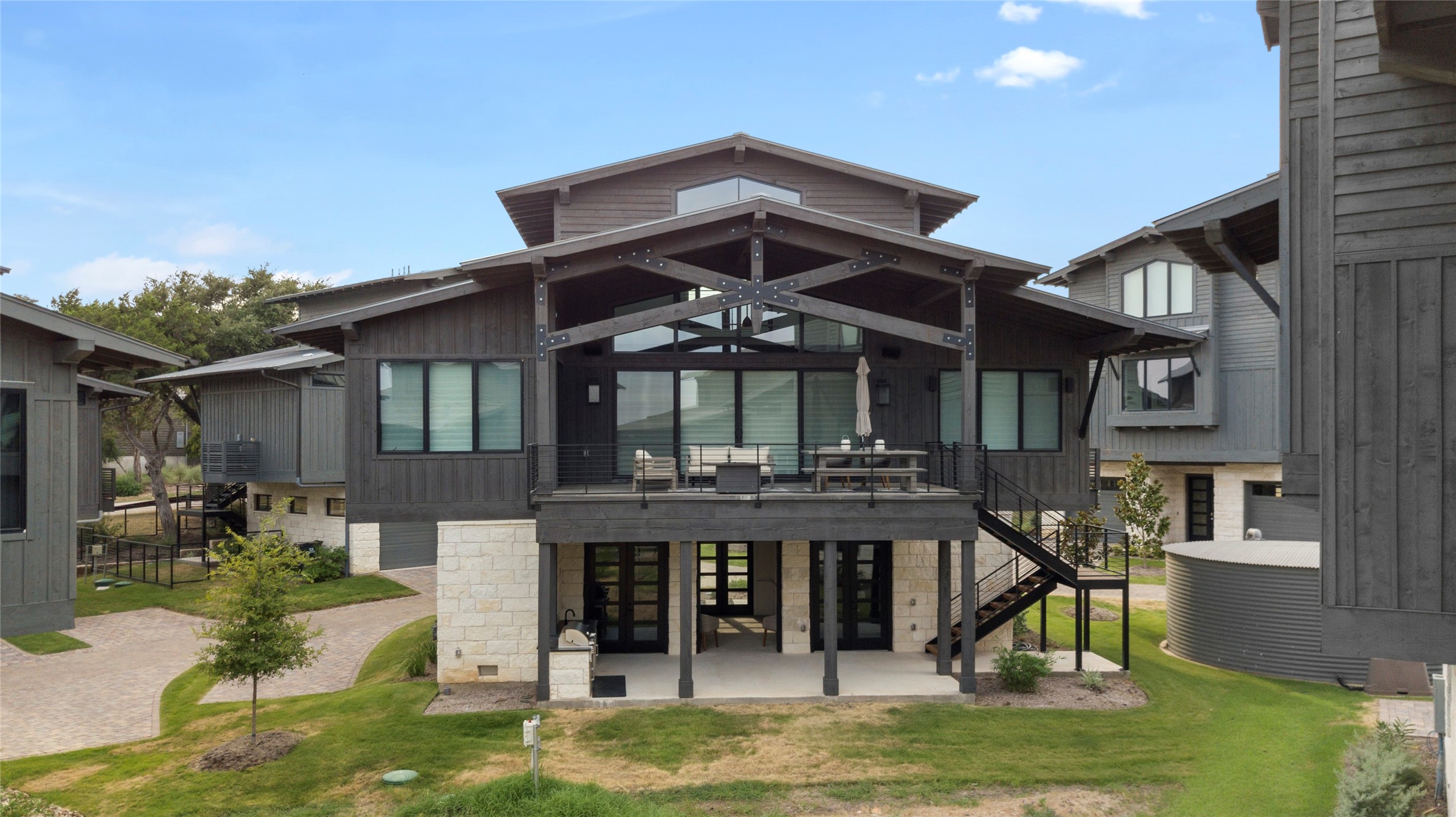 The treehouse is truly elevated living. Primary living space is above the garage and outdoor kitchen.