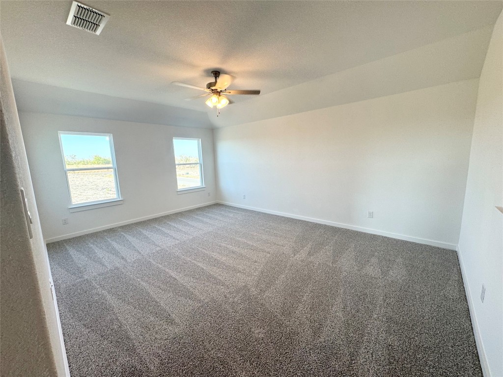 128 Hazy Vw Road San Marcos, TX 78666 - Photo 15 of 22 a view of an empty room with a window