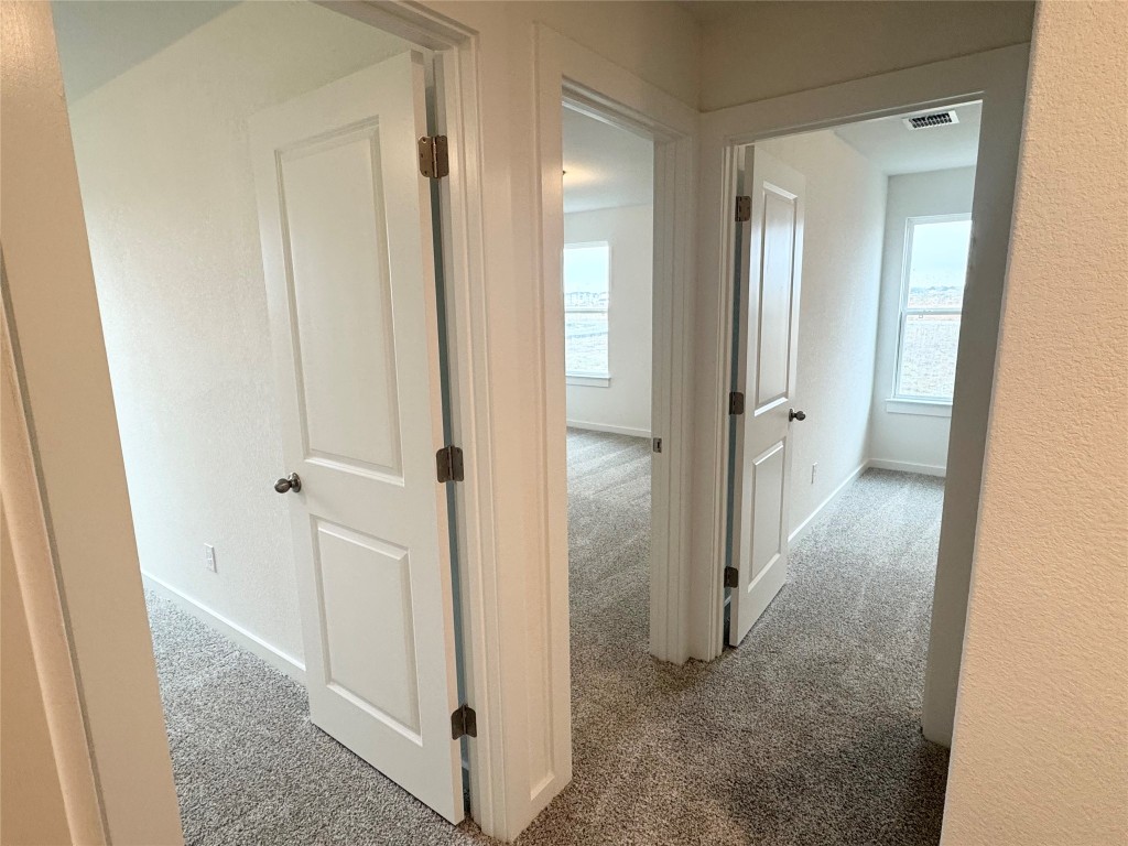 128 Hazy Vw Road San Marcos, TX 78666 - Photo 19 of 22 a view of a bathroom from the hallway