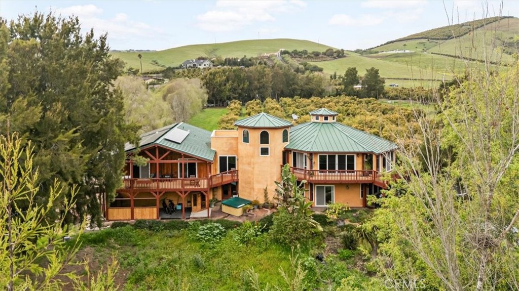 an aerial view of a house with a garden