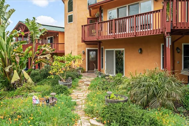 a outdoor space with lots of chairs and wooden floor