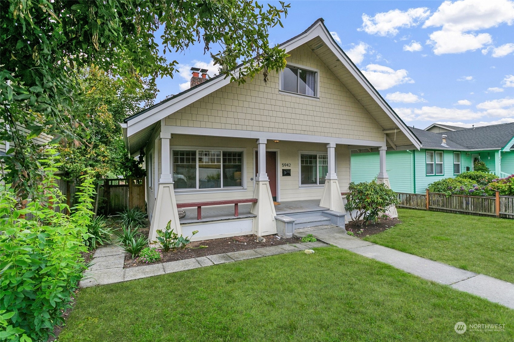 5942 41st Avenue Southwest Seattle, WA 98136 - Photo 2 of 40 a view of house with a yard