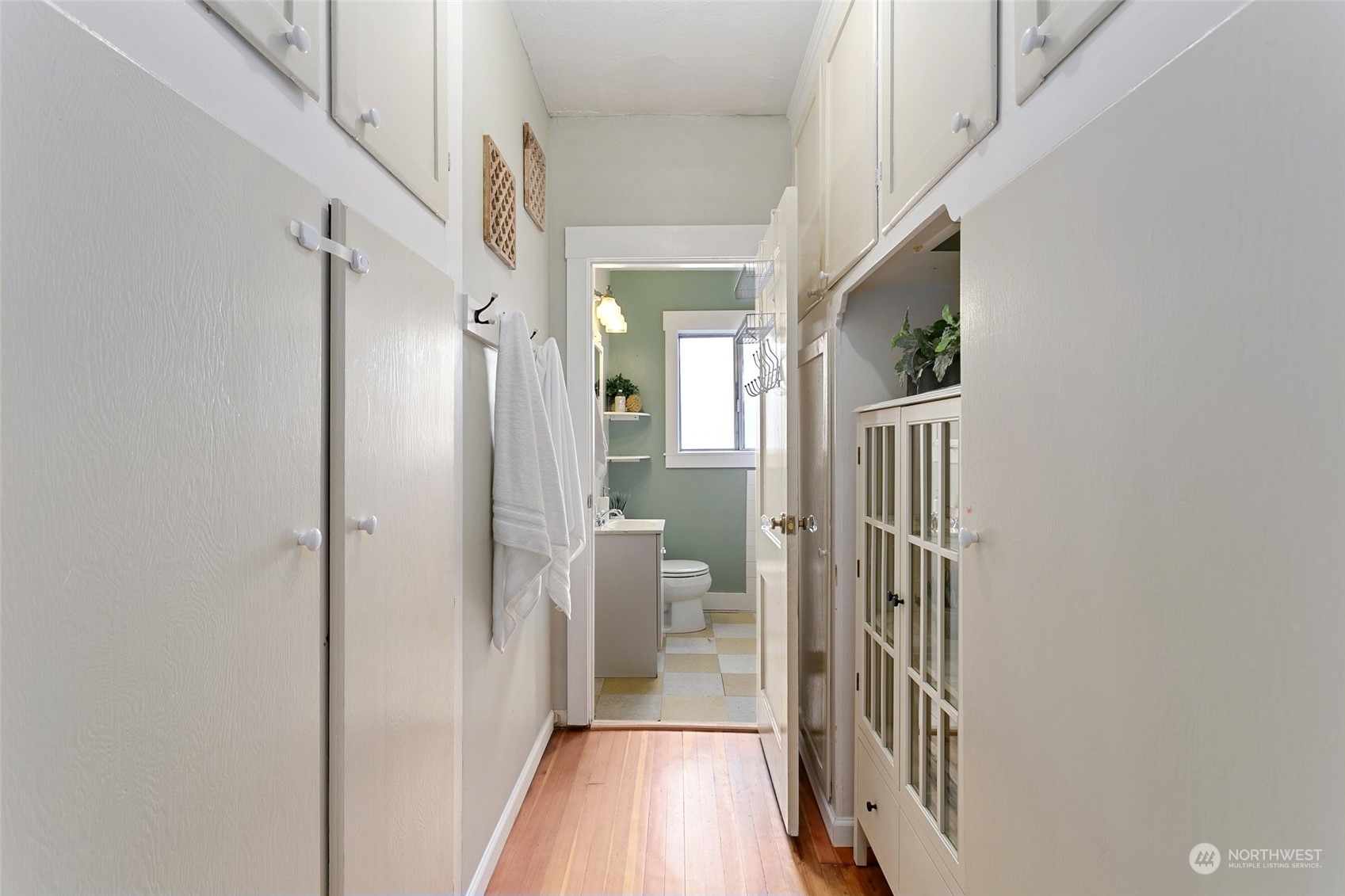 5942 41st Avenue Southwest Seattle, WA 98136 - Photo 23 of 40 a view of a hallway with a livingroom and a dinning room with a bathroom
