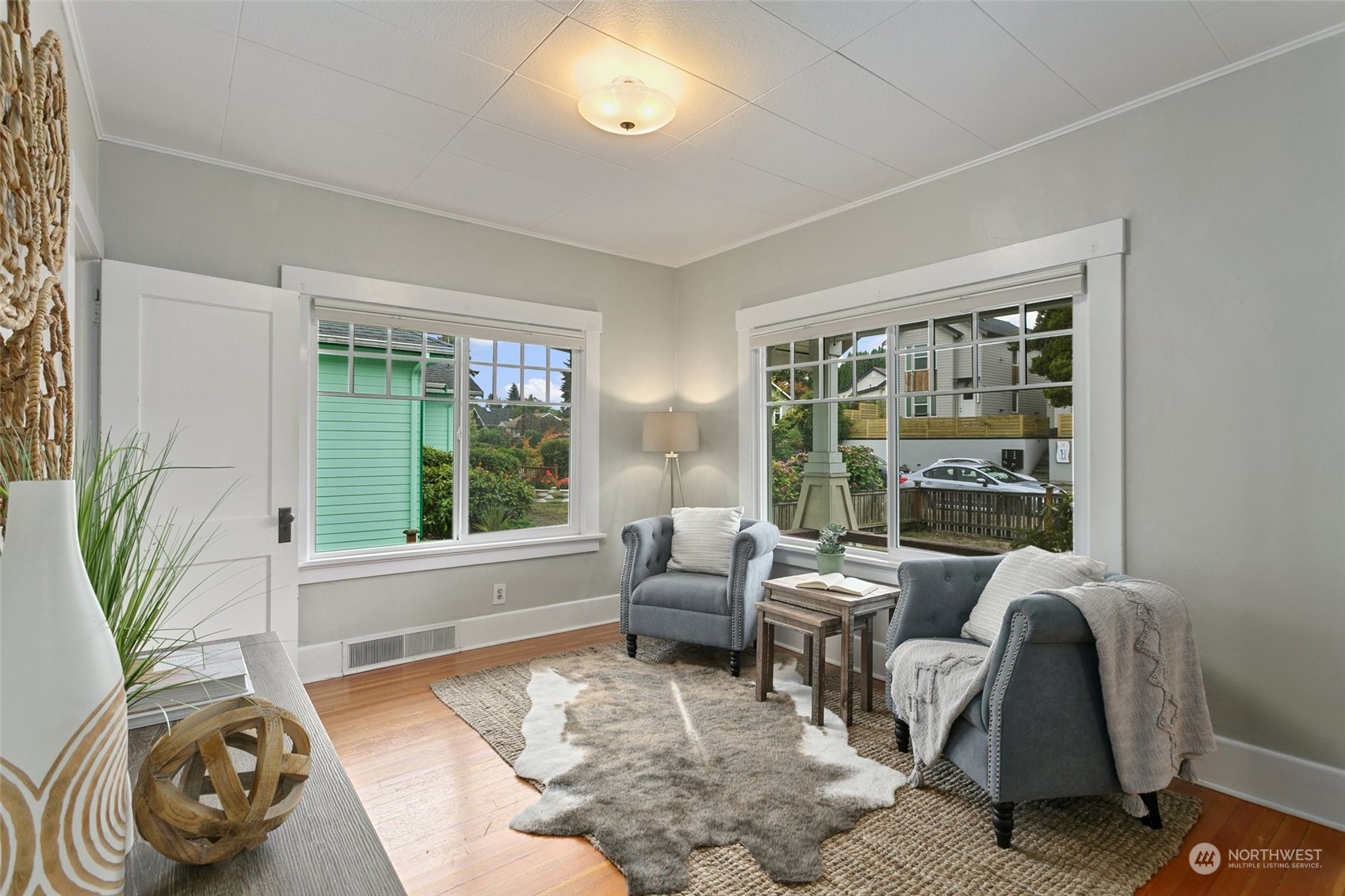 5942 41st Avenue Southwest Seattle, WA 98136 - Photo 9 of 40 a living room with furniture and a large window
