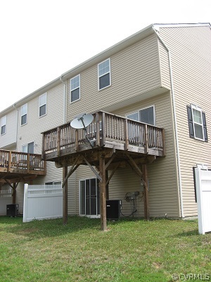 18296 Democracy Avenue Ruther Glen, VA 22546 - Photo 2 of 7 a view of a house with a yard