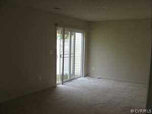18296 Democracy Avenue Ruther Glen, VA 22546 - Photo 4 of 7 an empty room with windows