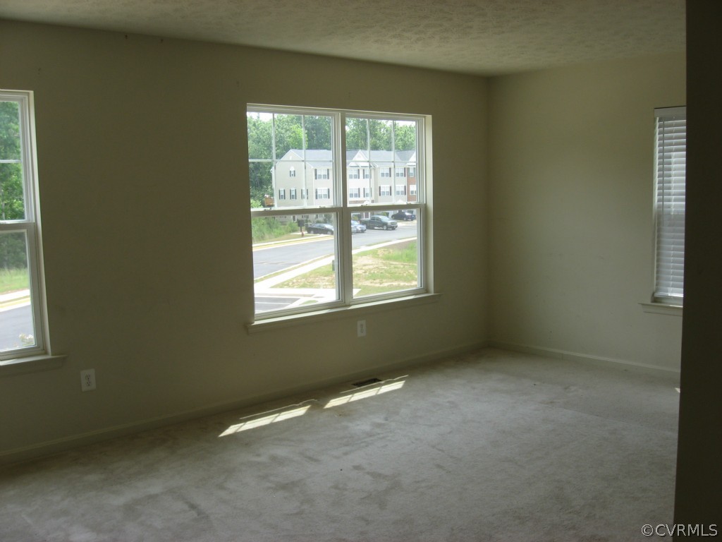 18296 Democracy Avenue Ruther Glen, VA 22546 - Photo 6 of 7 an empty room with a window