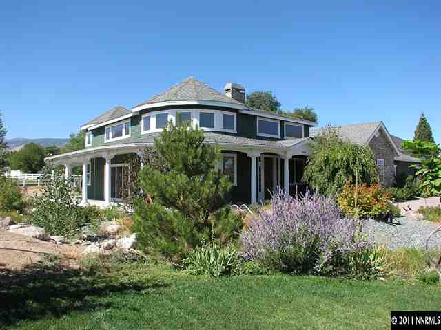 300 Vera Drive Reno, NV 89511 - Photo 1 of 13 a front view of a house with a yard