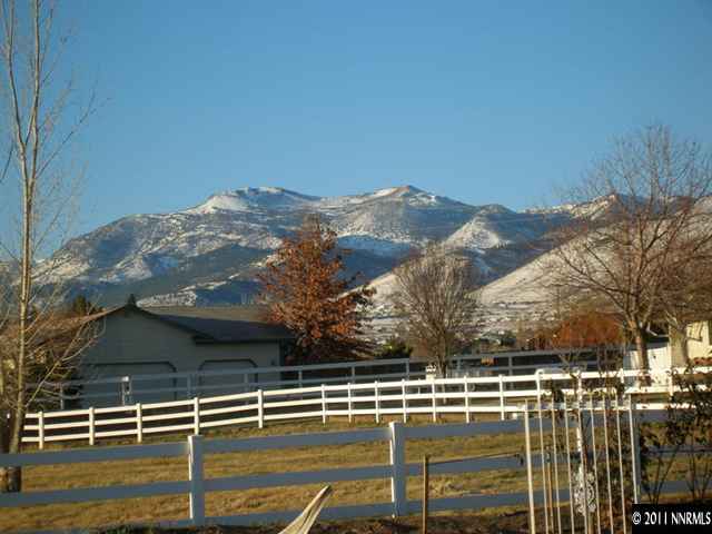 300 Vera Drive Reno, NV 89511 - Photo 11 of 13 a view of a swimming pool with mountains in the background