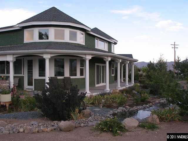 300 Vera Drive Reno, NV 89511 - Photo 12 of 13 a front view of a house with a yard