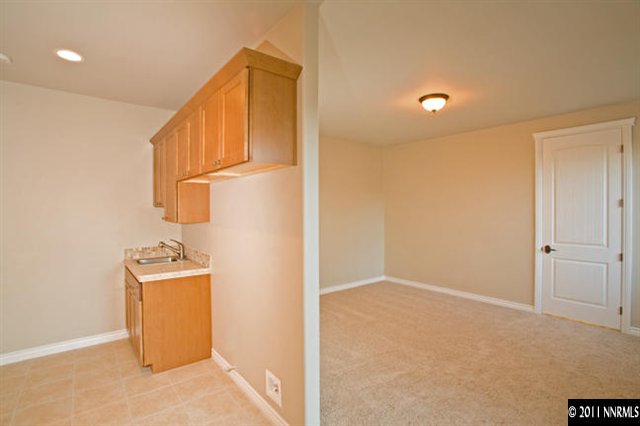 300 Vera Drive Reno, NV 89511 - Photo 10 of 13 a view of a storage & utility room with a sink