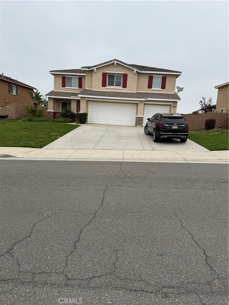 18318 Whitewater Way Riverside, CA 92508 - Photo 1 of 1 a car parked in front of white house