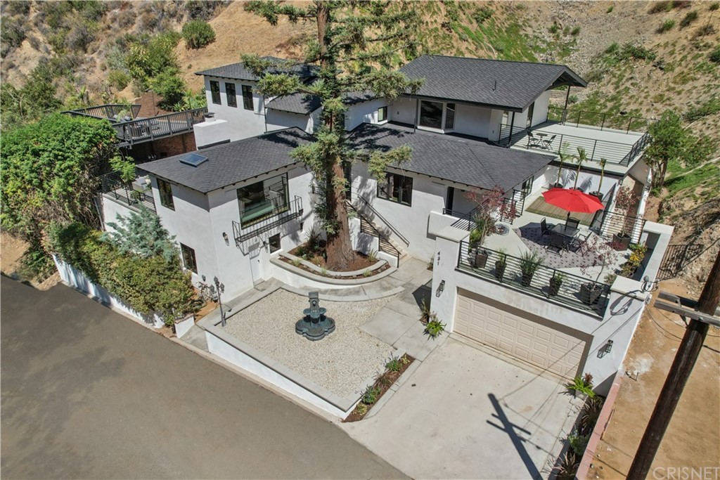 431 Nesmuth Road Glendale, CA 91202 - Photo 1 of 68 an aerial view of a house with garden space and sitting area