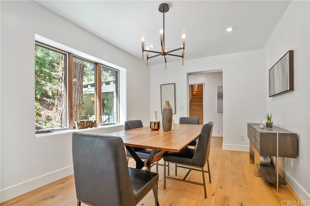 431 Nesmuth Road Glendale, CA 91202 - Photo 13 of 68 a dining room with furniture window and wooden floor