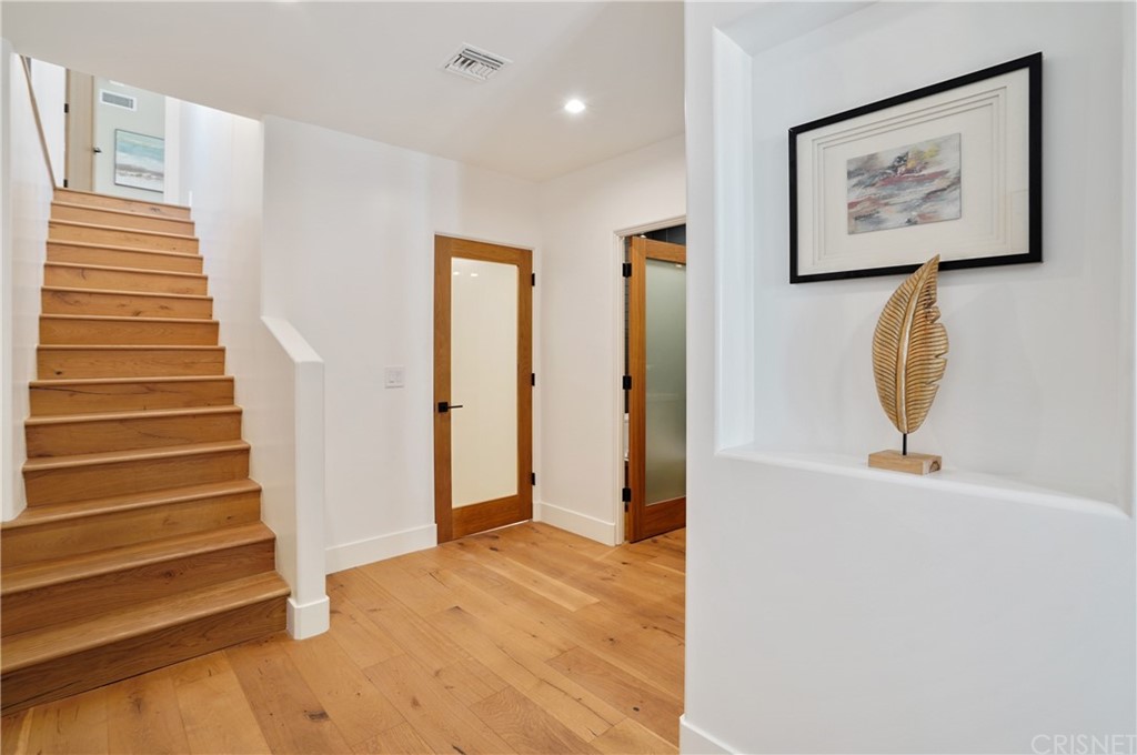 431 Nesmuth Road Glendale, CA 91202 - Photo 17 of 68 a view of an entryway with wooden floor