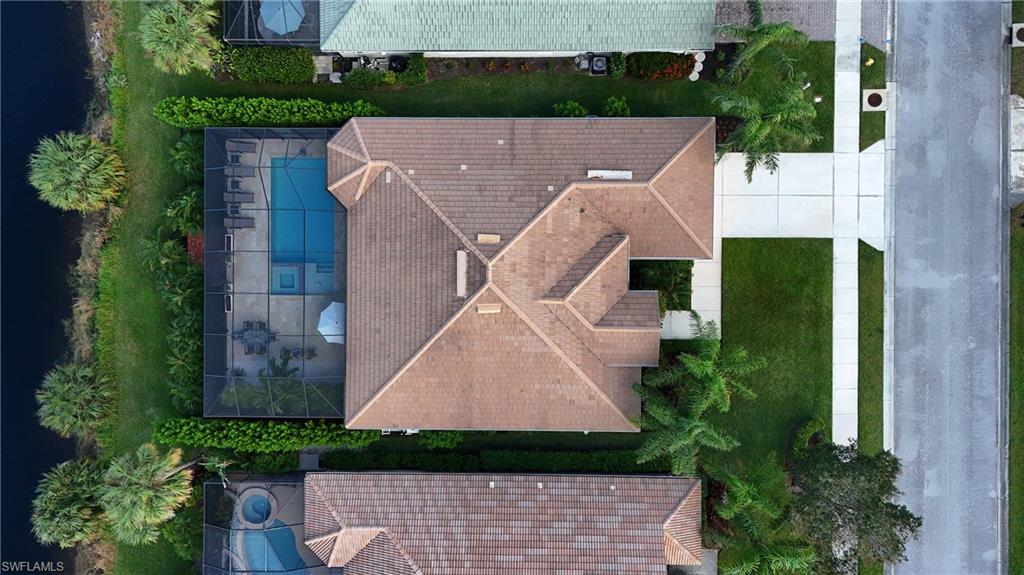 8239 Potomac Lane Naples, FL 34104 - Photo 2 of 47 an aerial view of a house with a yard