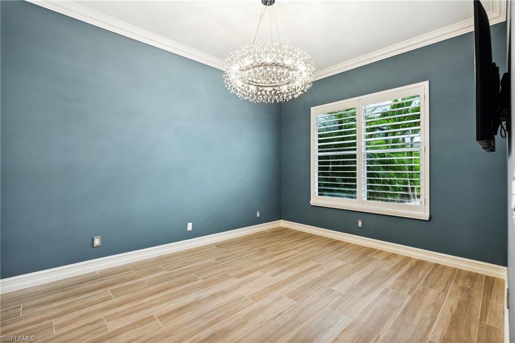 8239 Potomac Lane Naples, FL 34104 - Photo 32 of 47 a view of an empty room with a window