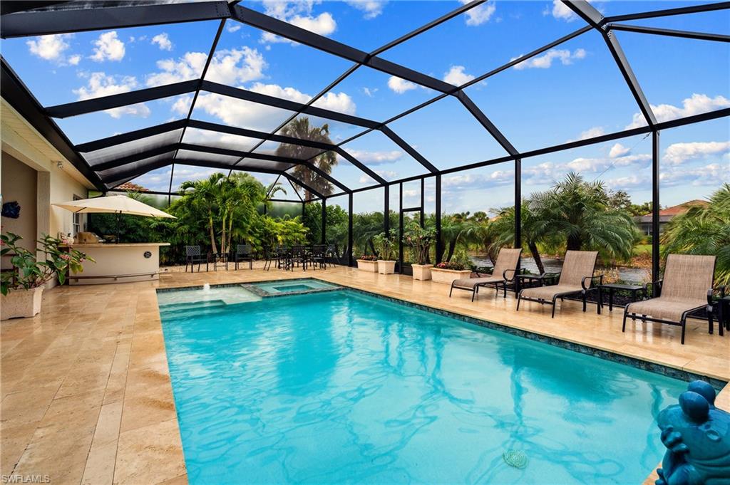 8239 Potomac Lane Naples, FL 34104 - Photo 4 of 47 a view of swimming pool with outdoor seating