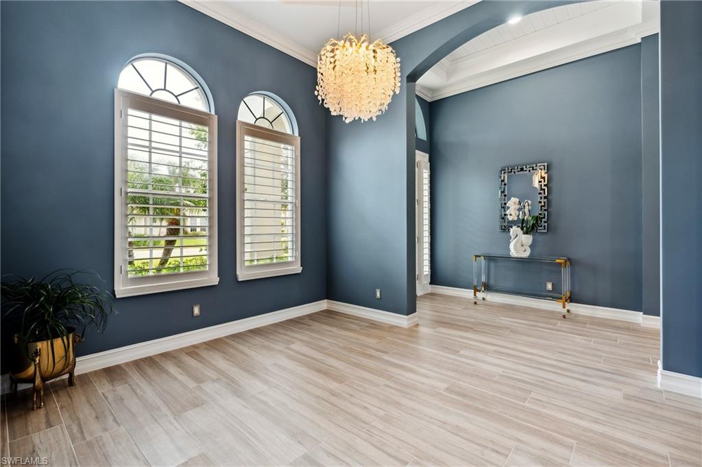 8239 Potomac Lane Naples, FL 34104 - Photo 8 of 47 a view of a livingroom with a window