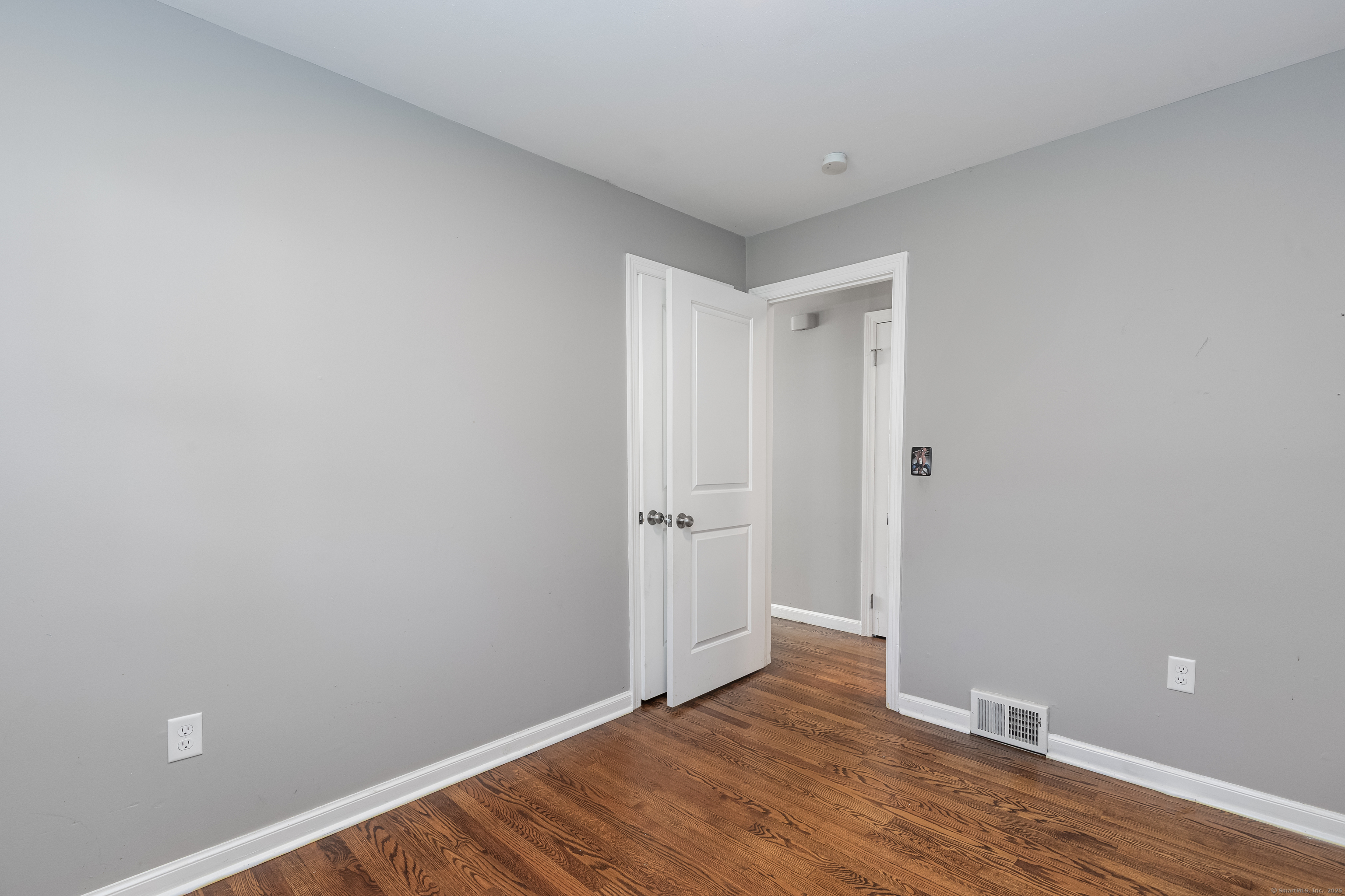 148 Central Avenue West Haven, CT 06516 - Photo 13 of 26 a view of an empty room and wooden floor