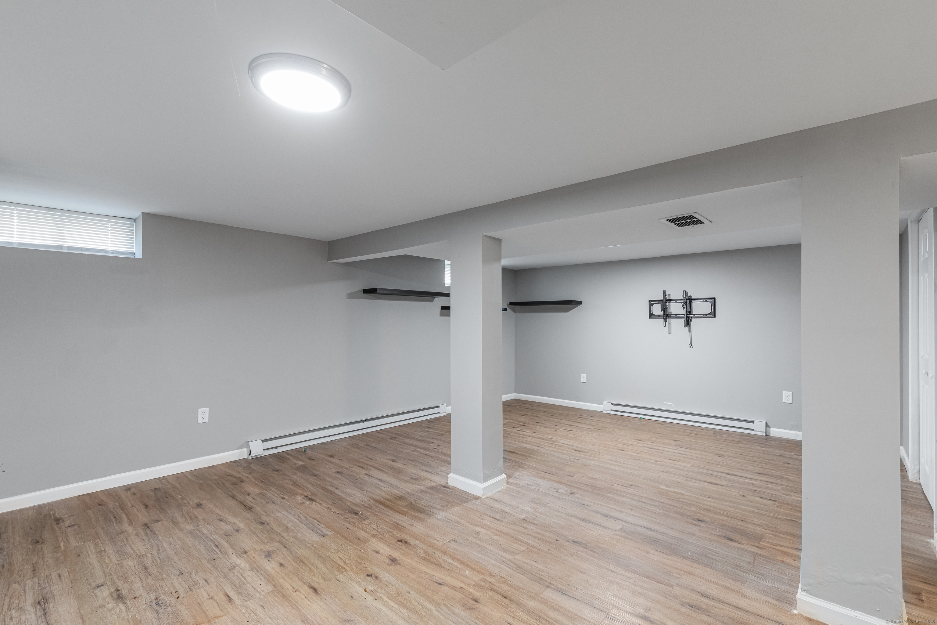 148 Central Avenue West Haven, CT 06516 - Photo 17 of 26 wooden floor in an empty room