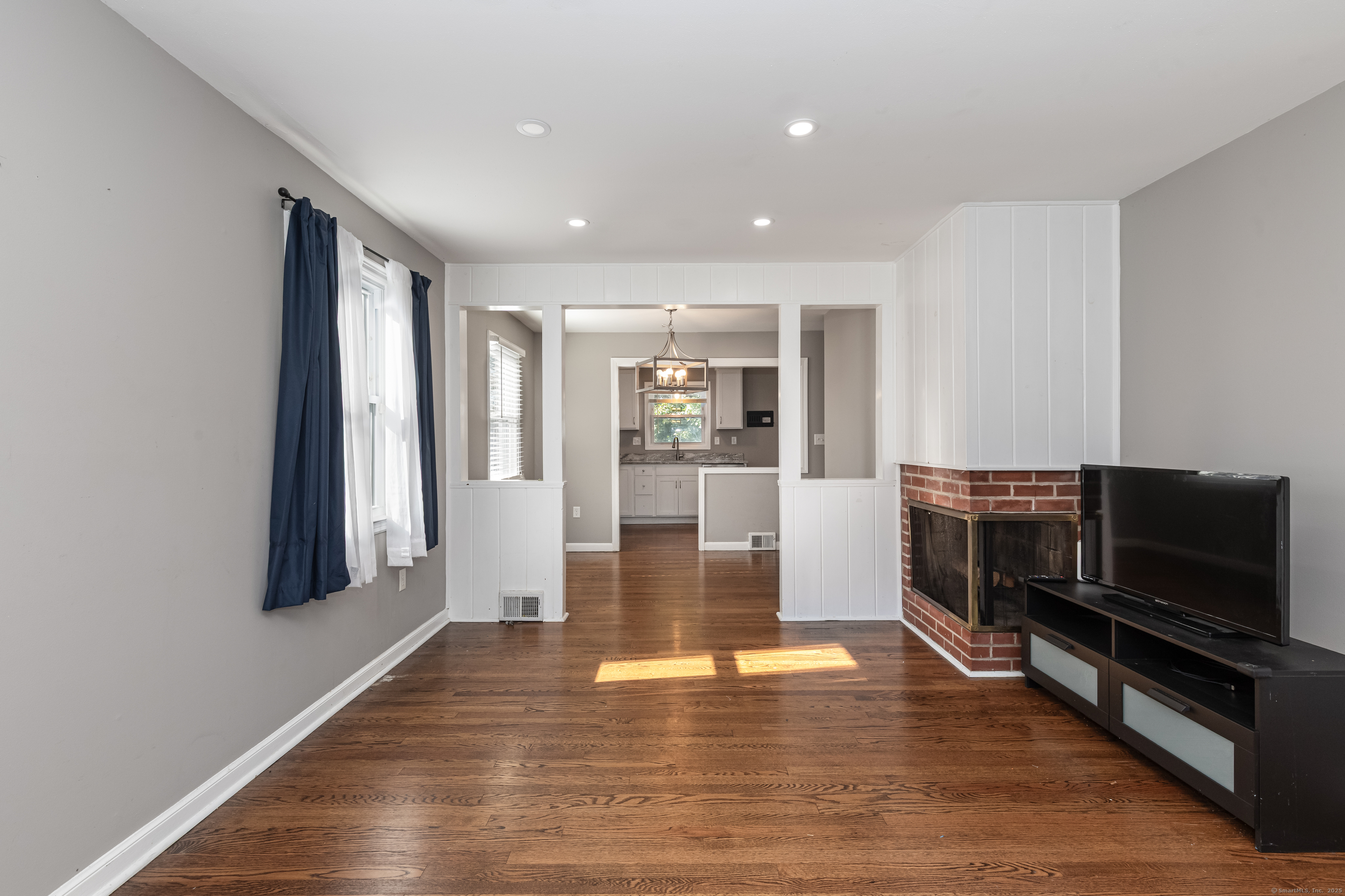 148 Central Avenue West Haven, CT 06516 - Photo 9 of 26 a view of living room with furniture and flat screen tv