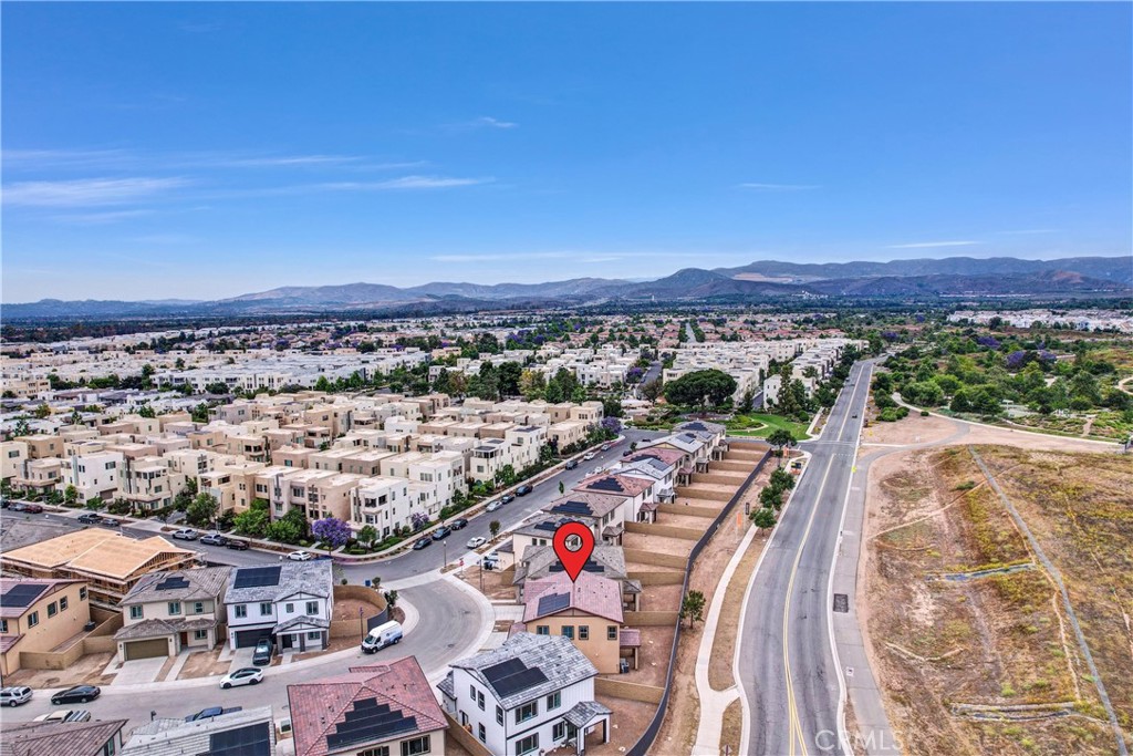252 Lily Loop Irvine, CA 92618 - Photo 5 of 6 an aerial view of a city