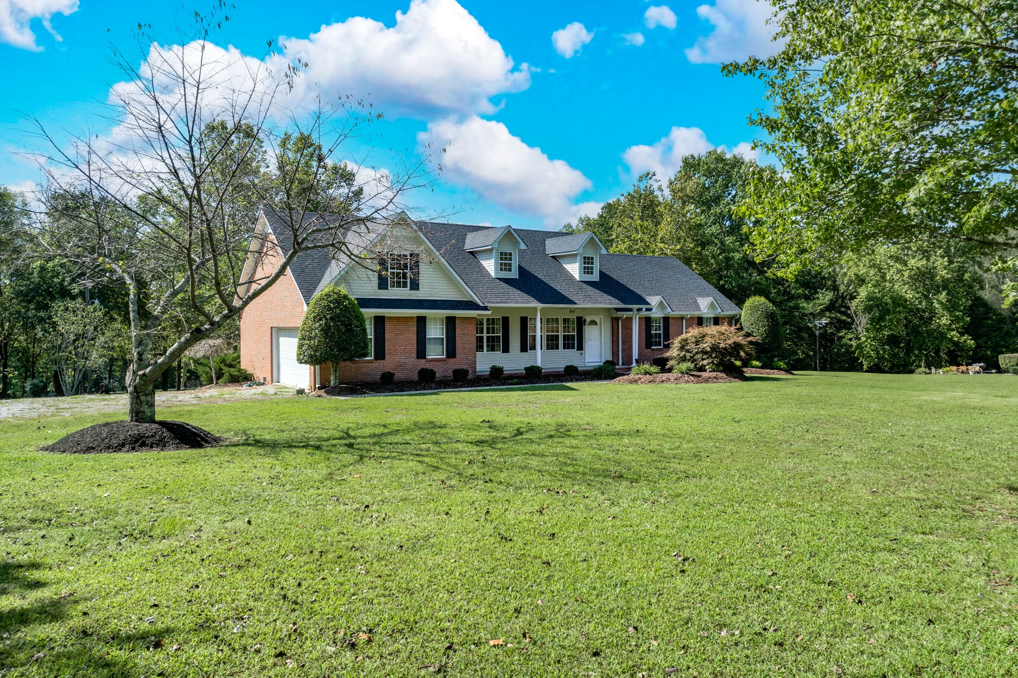 1346 Sam Johnson Road Columbia, TN 38401 - Photo 1 of 17 a front view of house with yard and green space