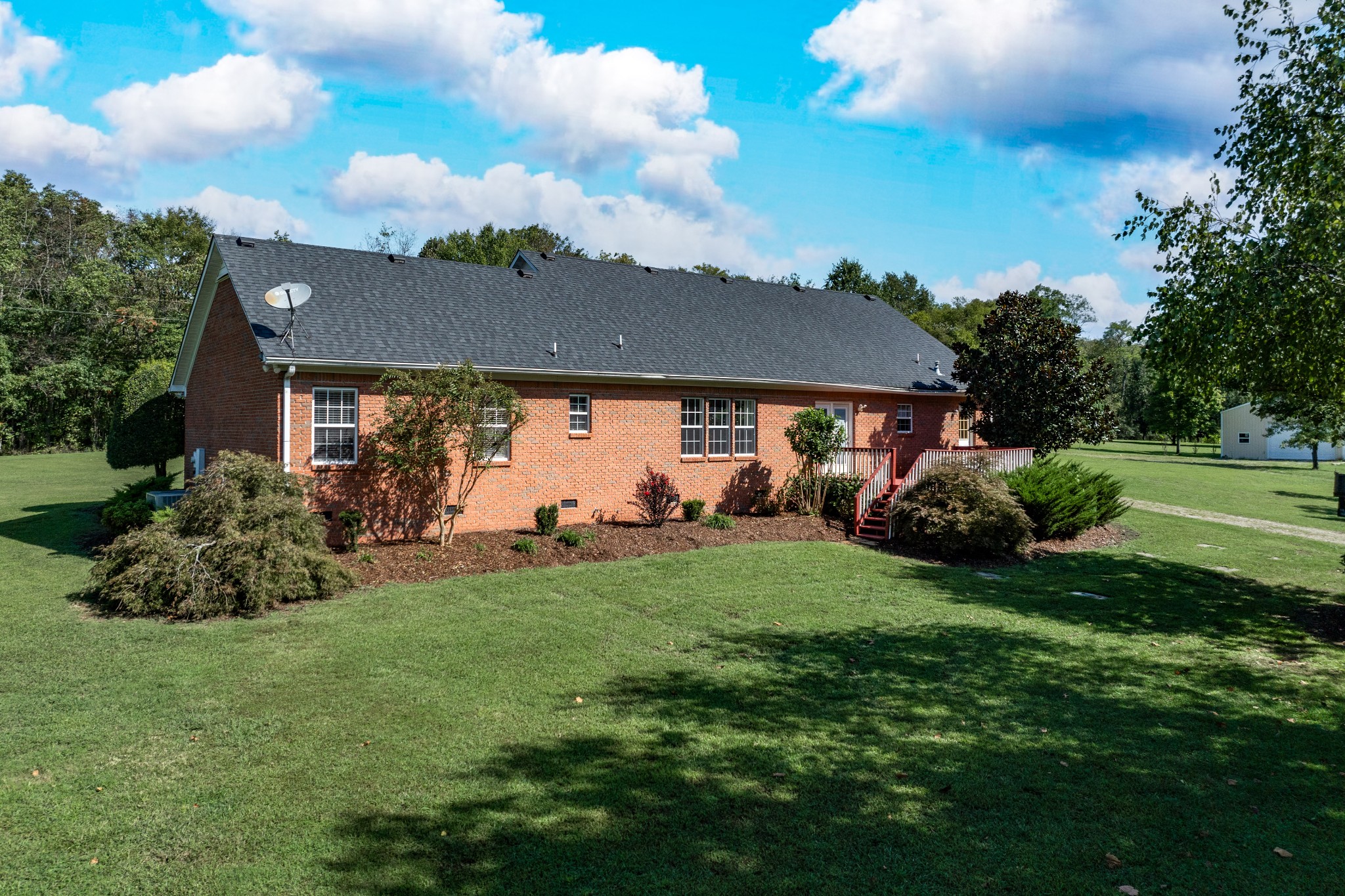 1346 Sam Johnson Road Columbia, TN 38401 - Photo 4 of 17 a view of a house with a backyard