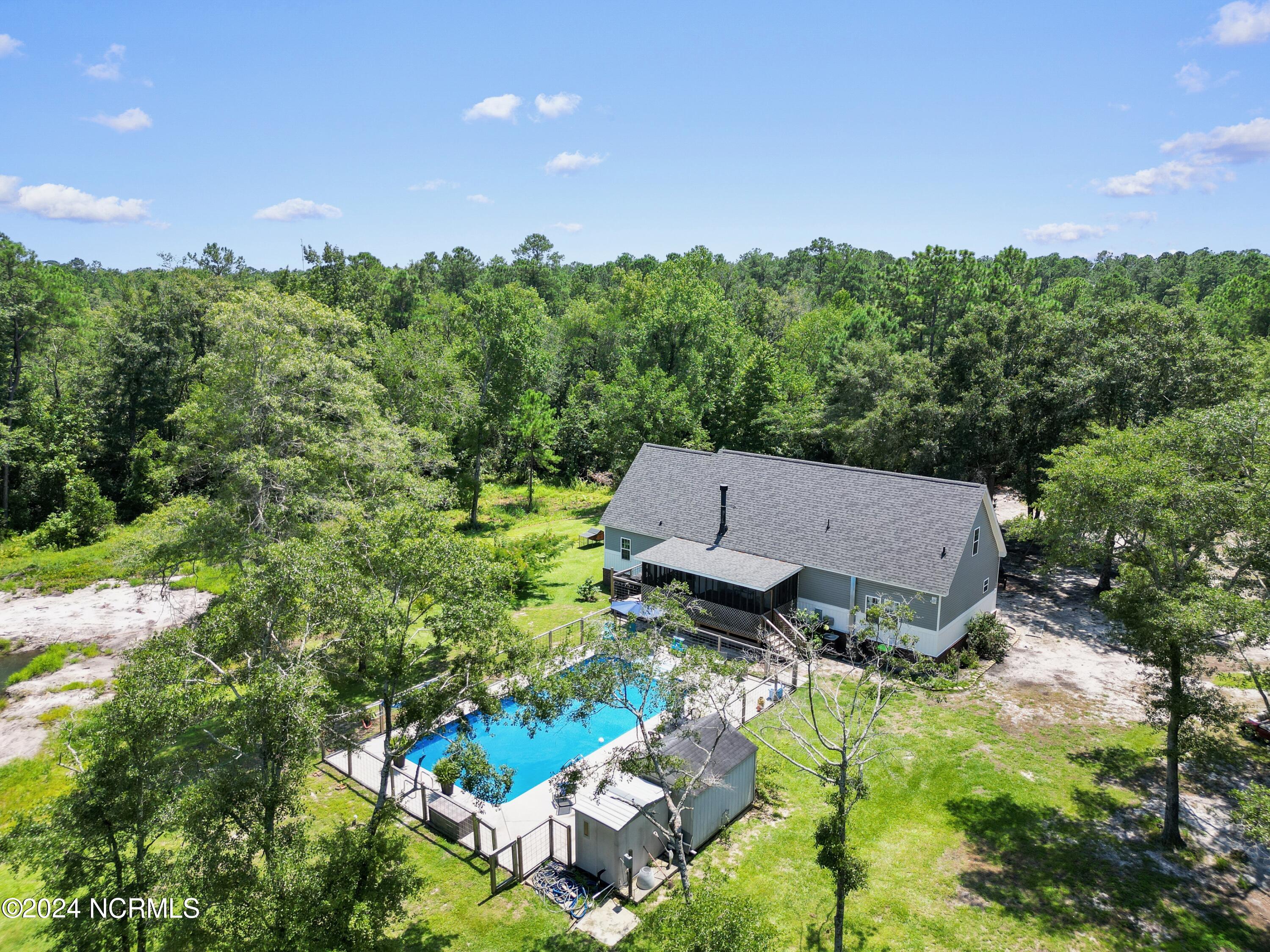 1736 Maco Road Northeast Leland, NC 28451 - Photo 4 of 52 In Ground Pool
