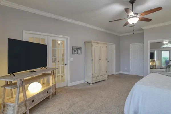 a view of a hallway view with staircase