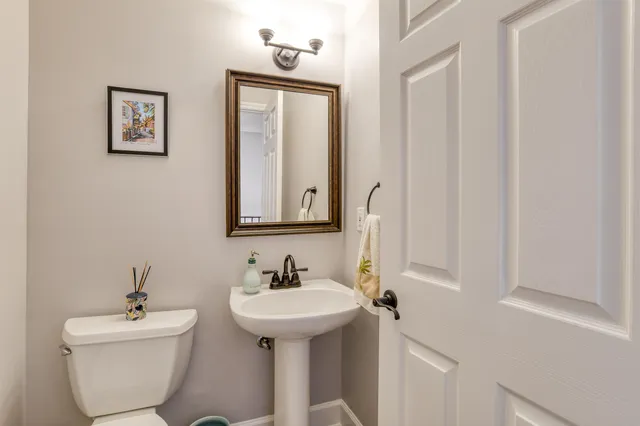 a view of a chairs and table in patio