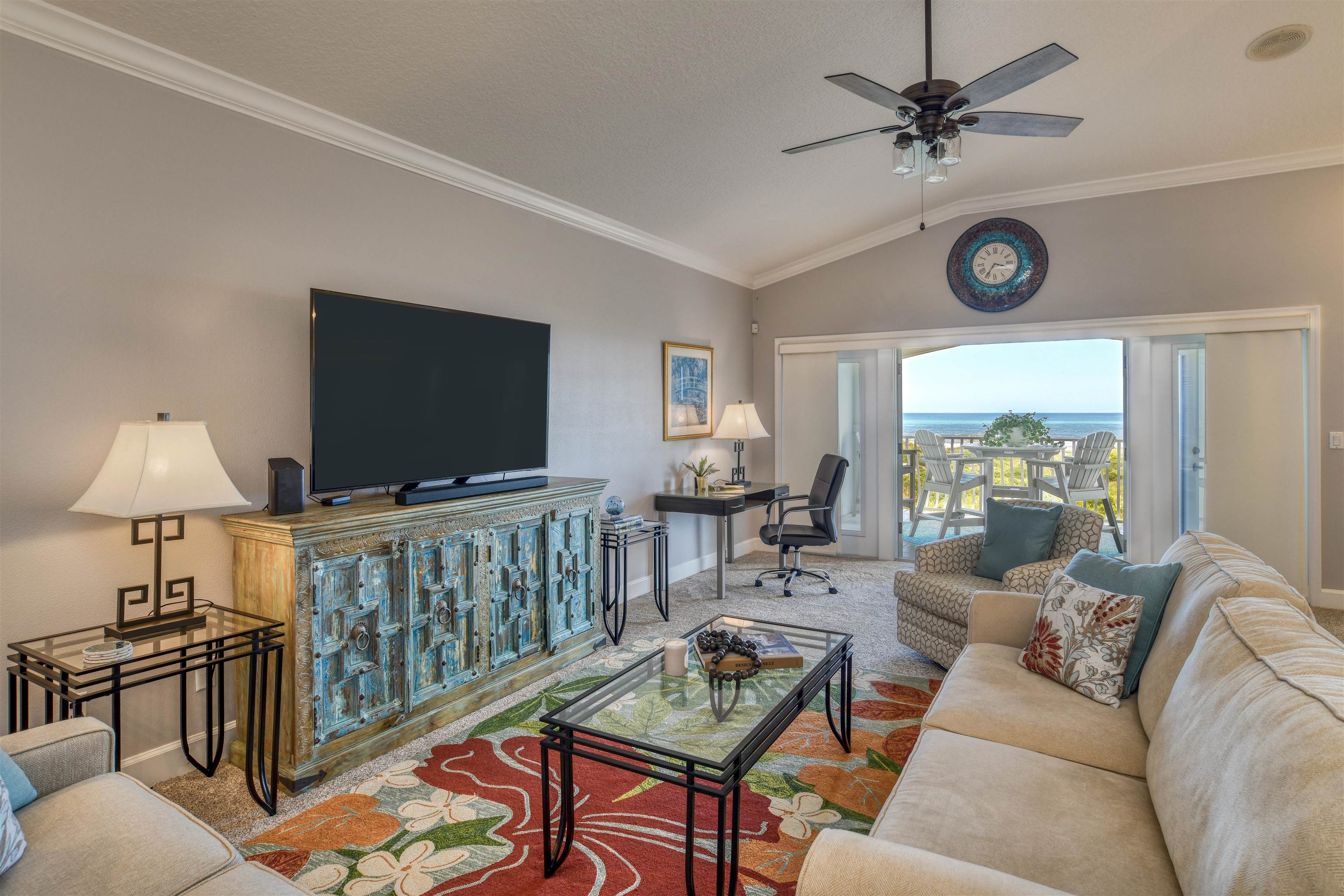 616 Mediterranean Way St. Augustine, FL 32080 - Photo 34 of 64 a living room with furniture a flat screen tv and a window
