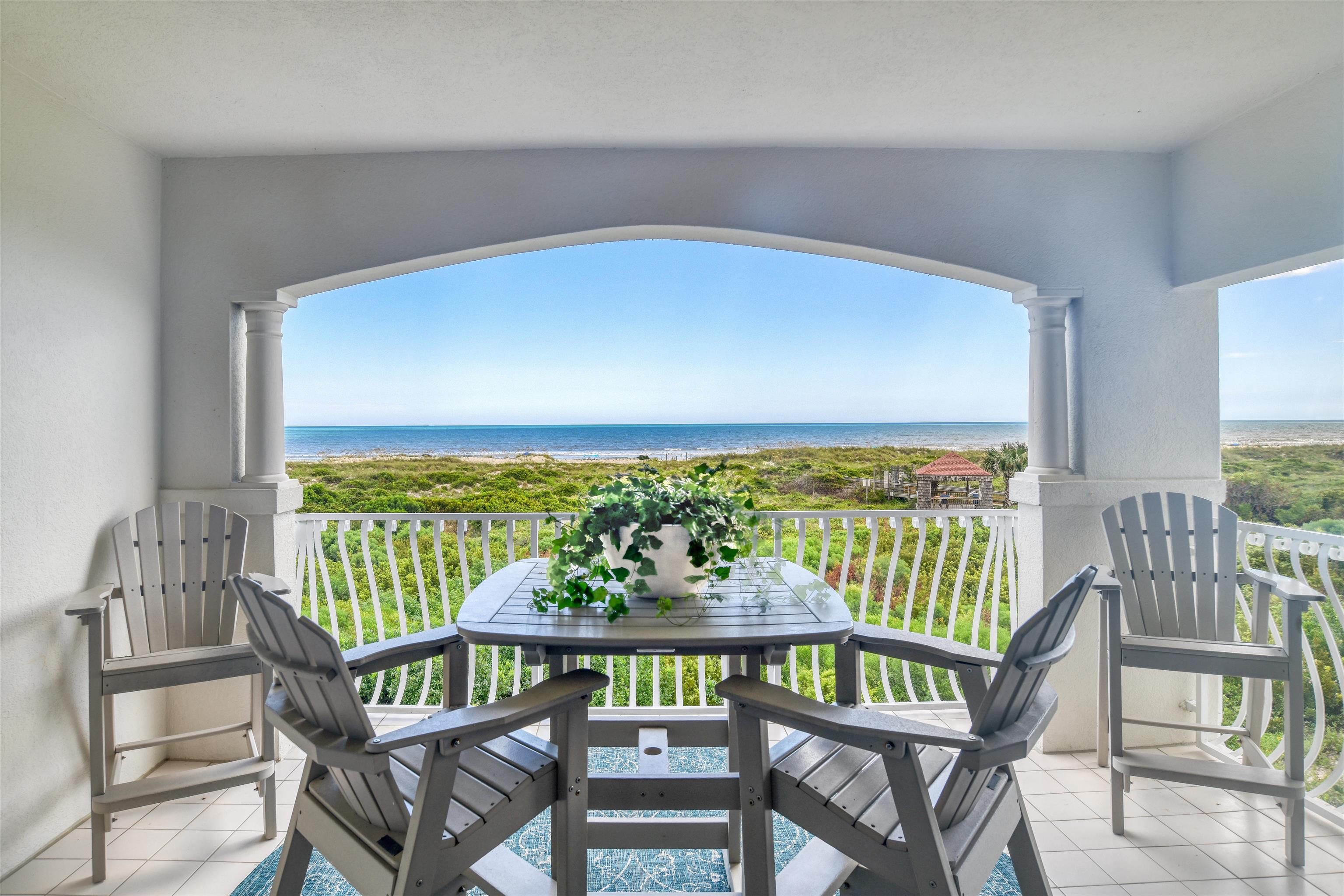 616 Mediterranean Way St. Augustine, FL 32080 - Photo 35 of 64 a view of a chairs and table in the balcony