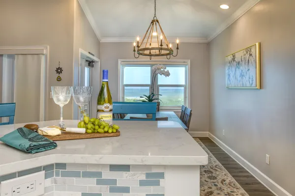a bedroom with a bed and glass window