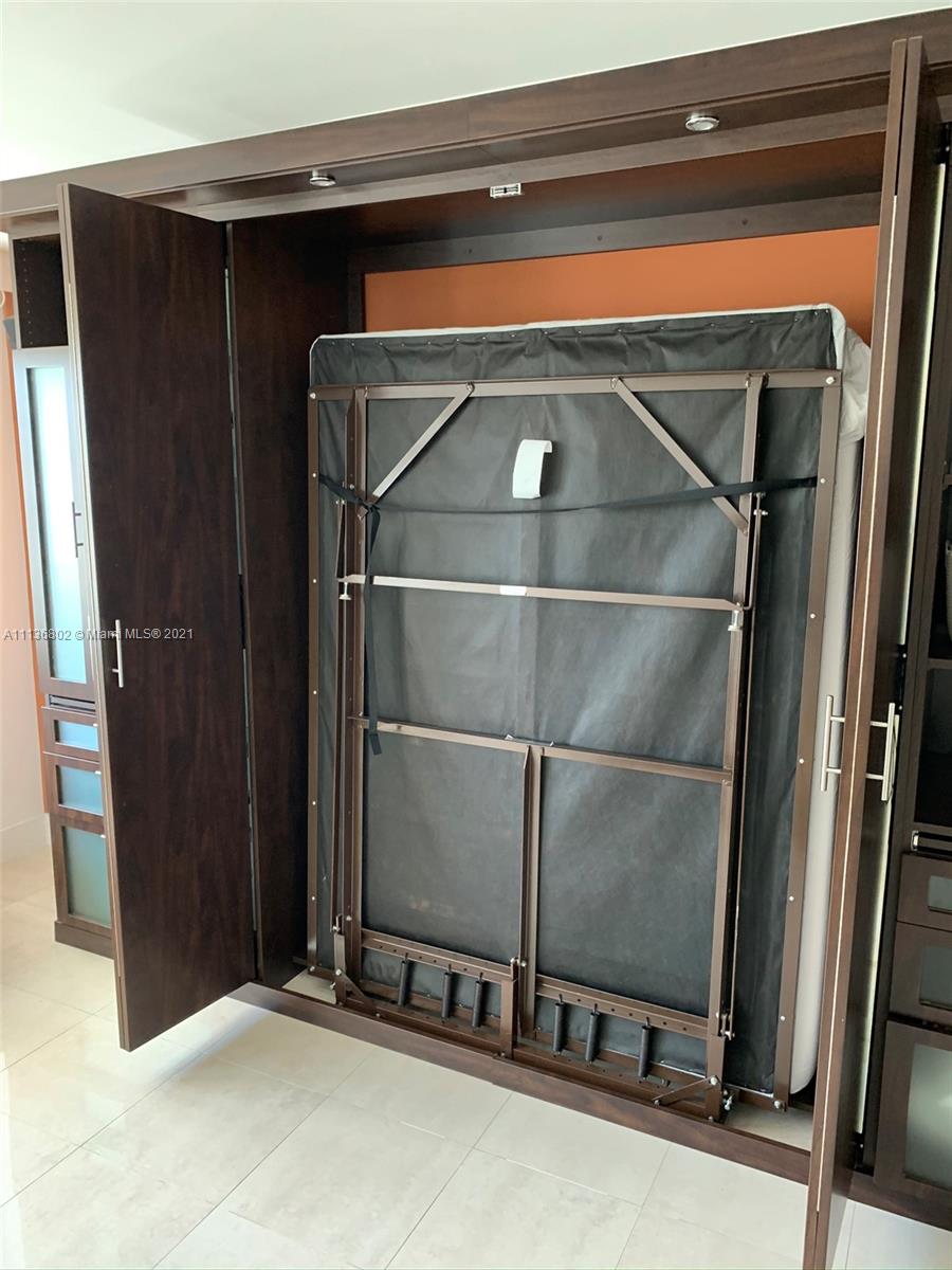 100 Lincoln Road, Unit 928 Miami Beach, FL 33139 - Photo 11 of 21 a room with washing machine