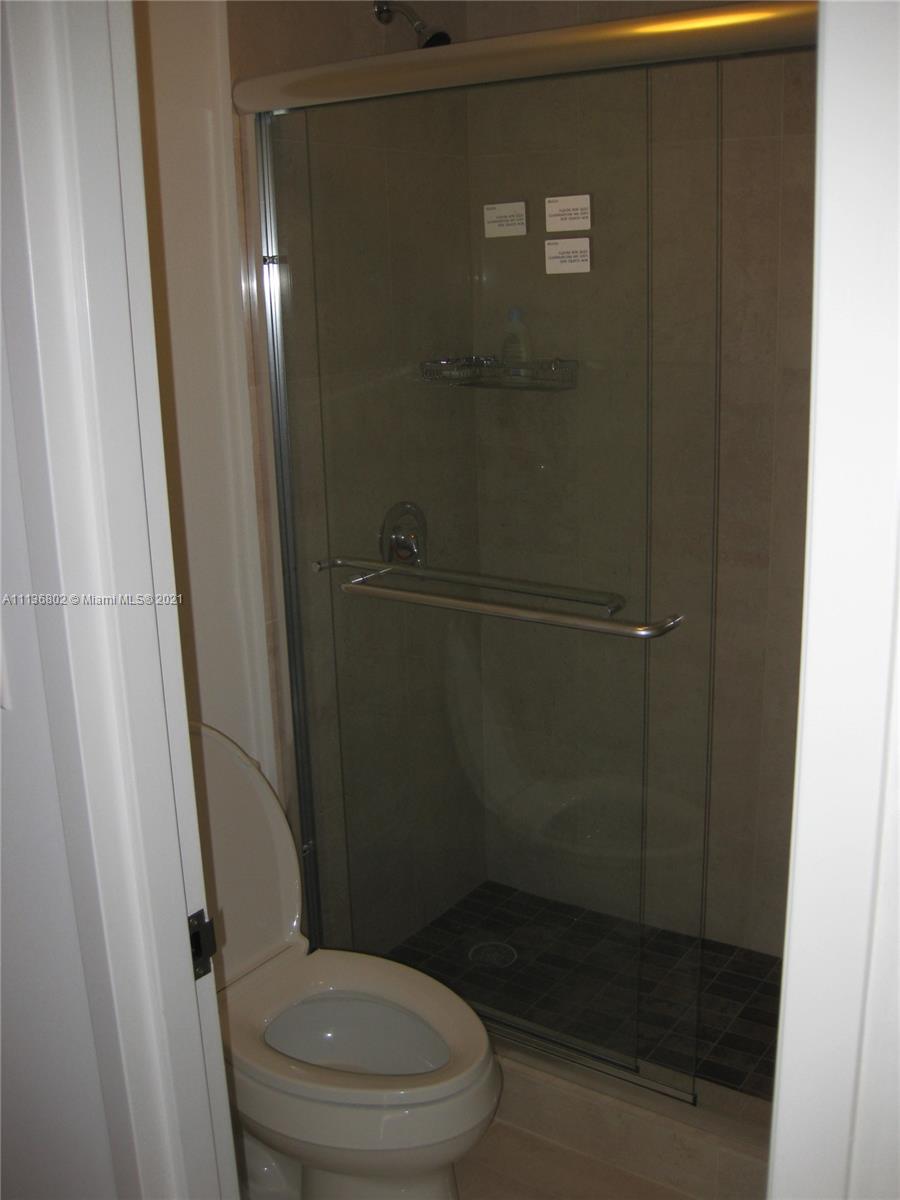 100 Lincoln Road, Unit 928 Miami Beach, FL 33139 - Photo 8 of 21 a bathroom with a toilet and a shower