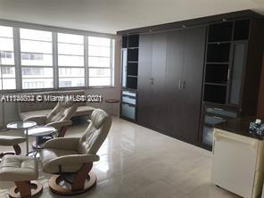 100 Lincoln Road, Unit 928 Miami Beach, FL 33139 - Photo 10 of 21 a living room with furniture and a window