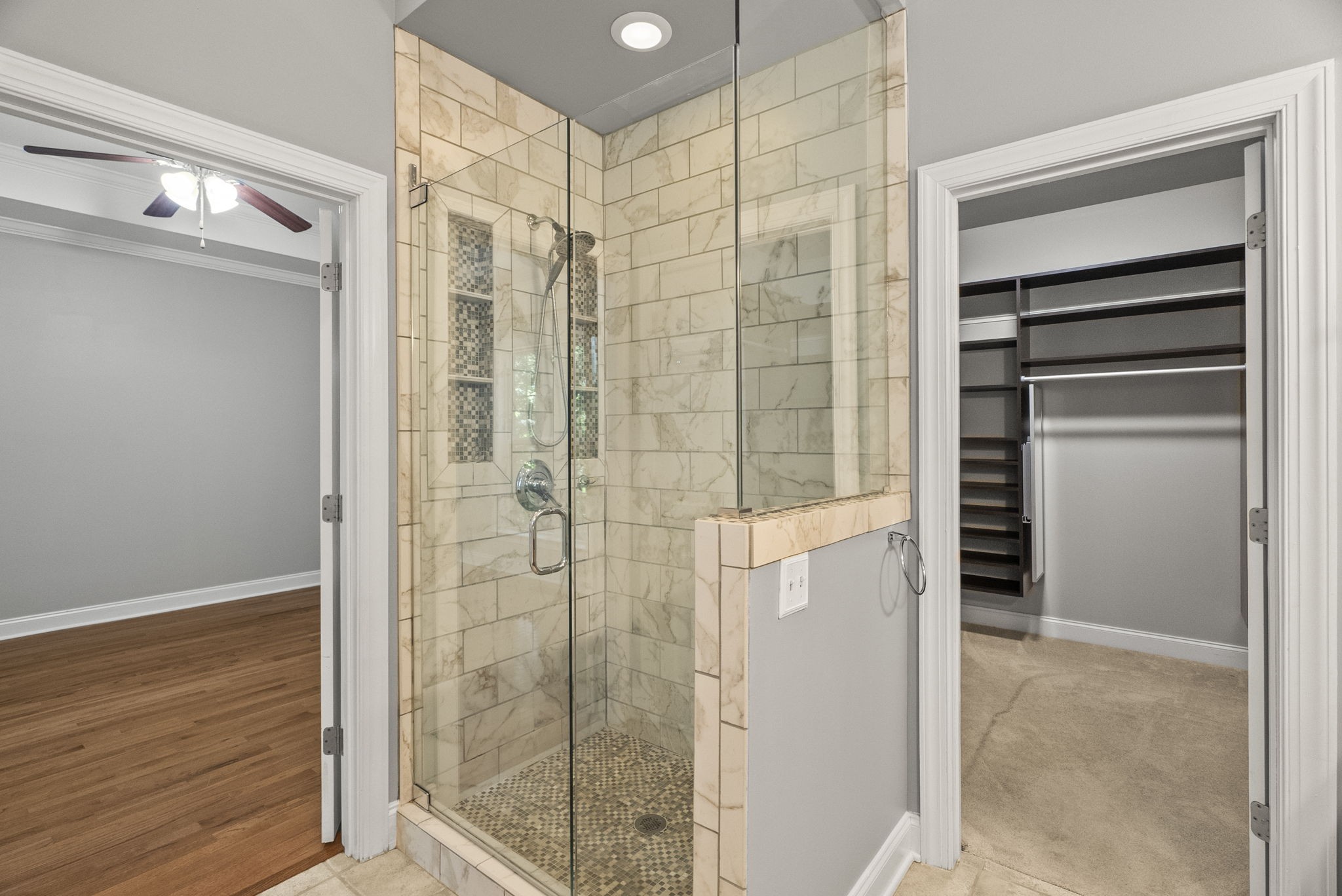 205 Yearling Trace Pleasant View, TN 37146 - Photo 19 of 29 a bathroom with a shower and a glass door