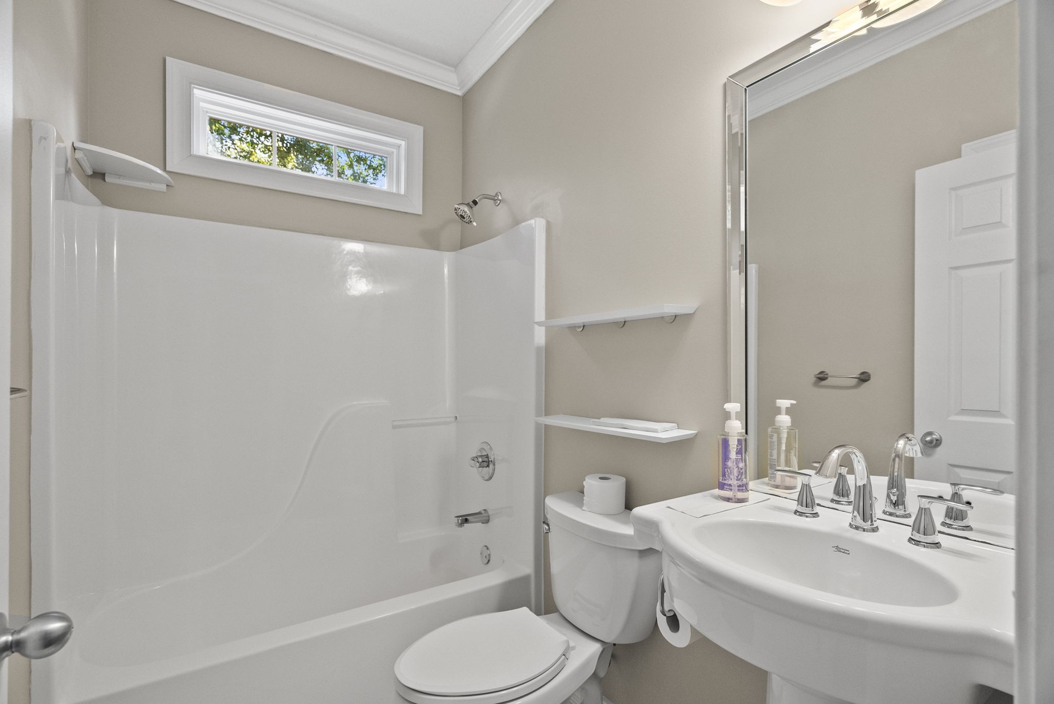 205 Yearling Trace Pleasant View, TN 37146 - Photo 23 of 29 a bathroom with a sink toilet and shower