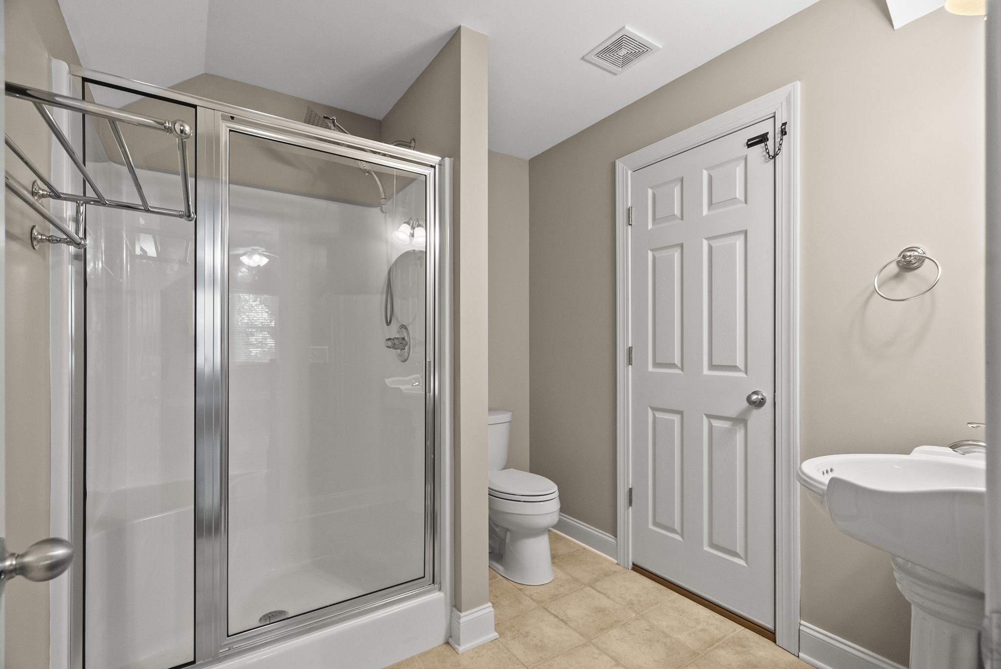 205 Yearling Trace Pleasant View, TN 37146 - Photo 26 of 29 a bathroom with a granite countertop sink a toilet and shower