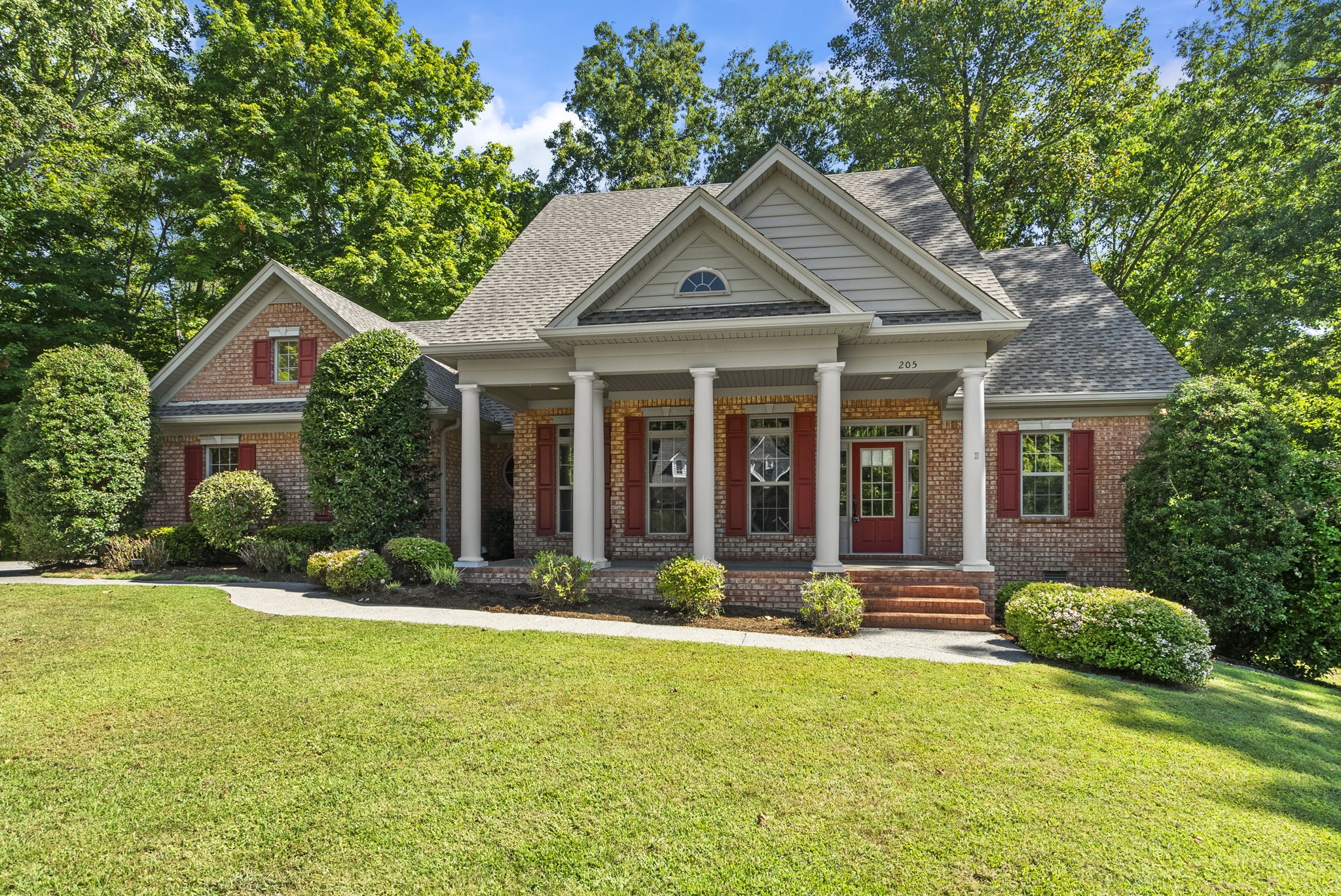 205 Yearling Trace Pleasant View, TN 37146 - Photo 4 of 29 a front view of a house with a yard