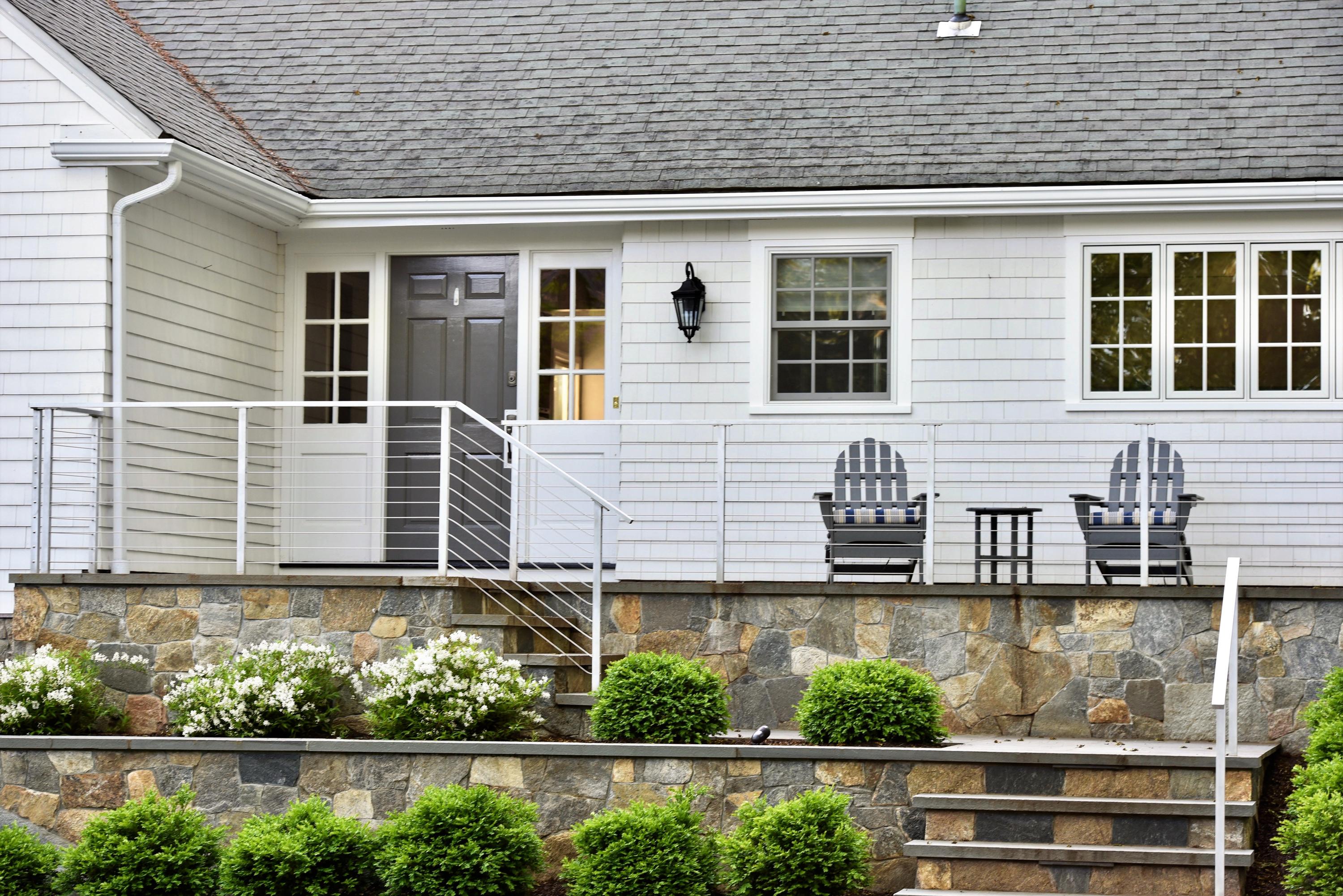 6 Runkenhage Road Darien, CT 06820 - Photo 2 of 32 a side view of a house with a balcony
