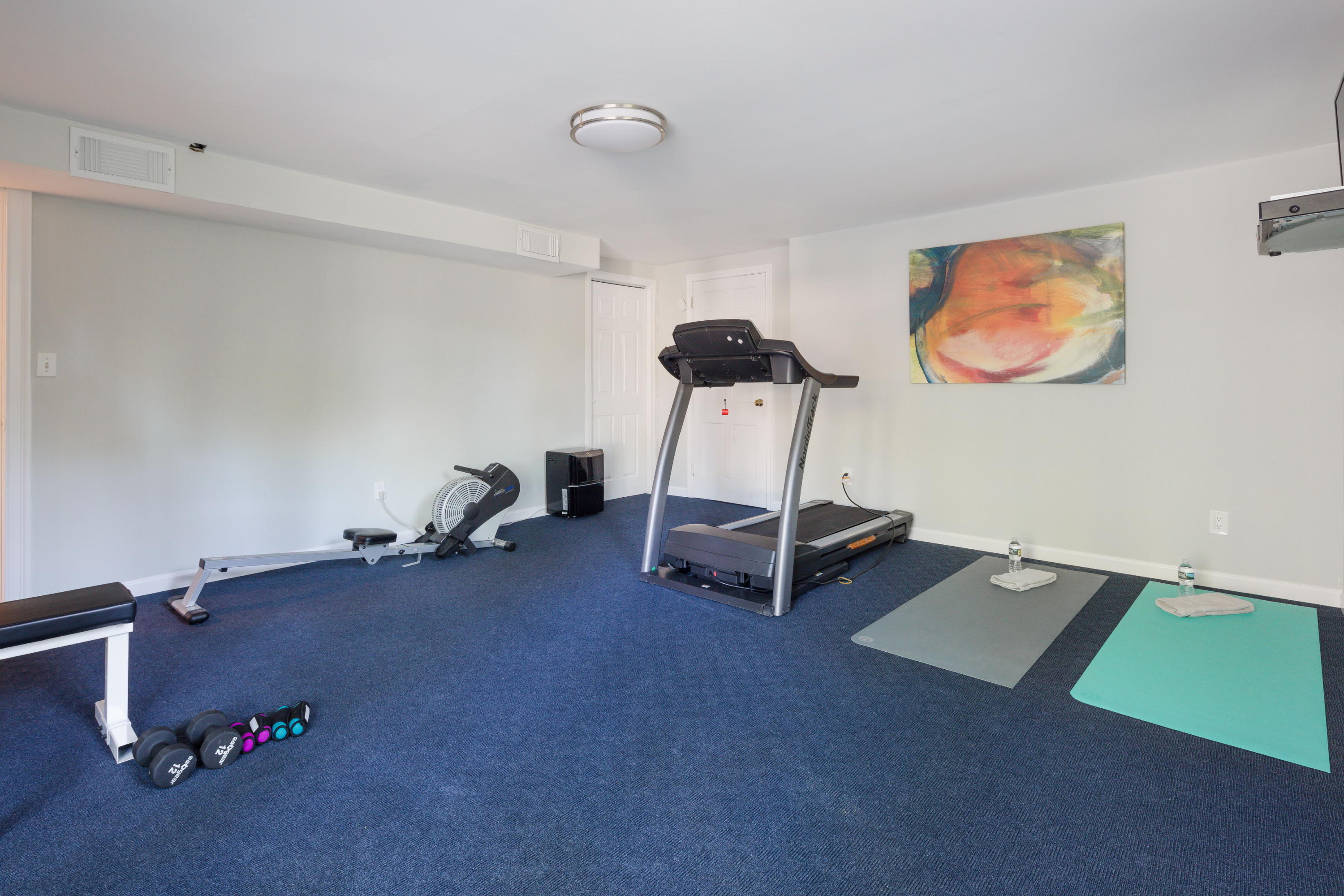6 Runkenhage Road Darien, CT 06820 - Photo 22 of 32 a room with gym equipment and a window