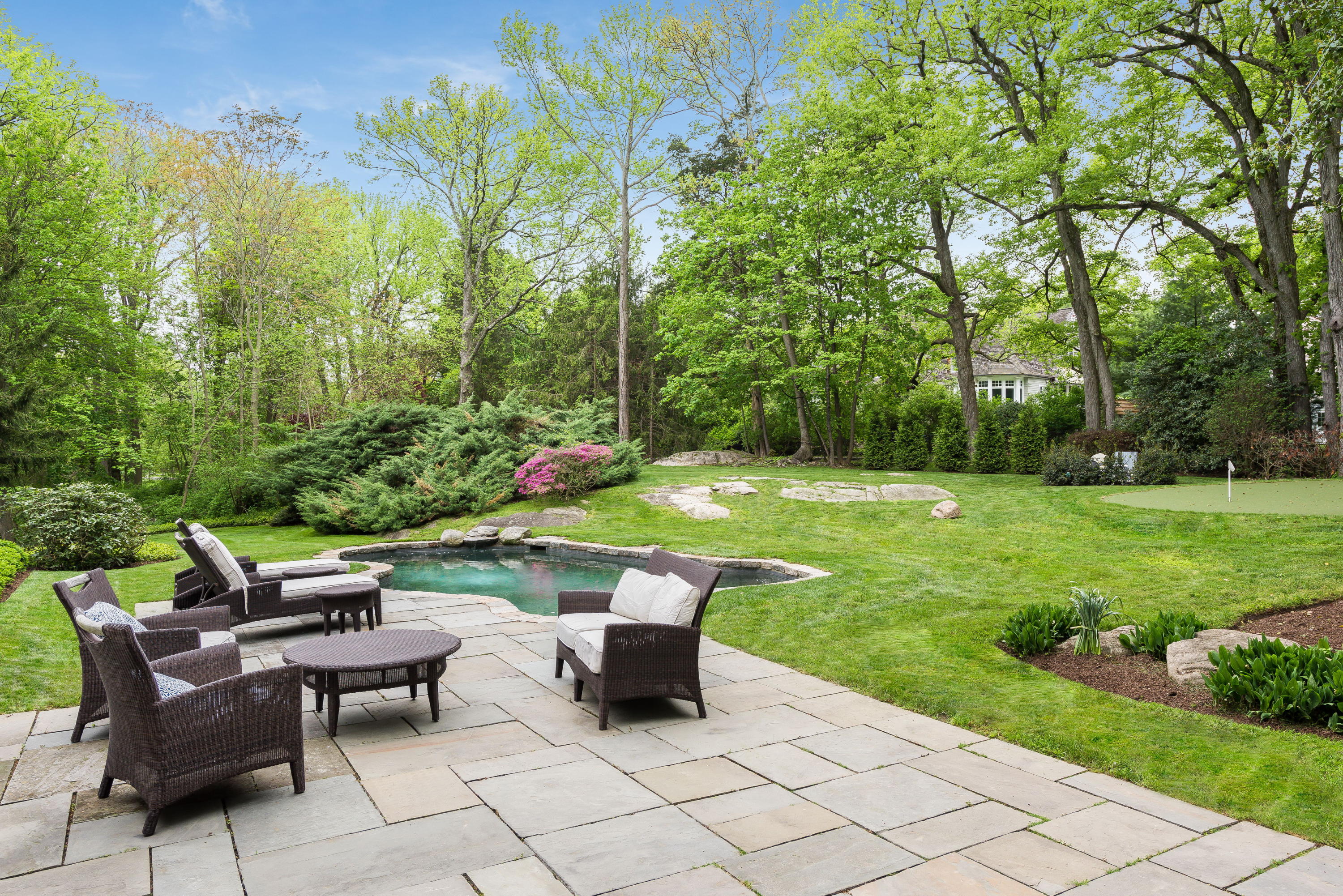6 Runkenhage Road Darien, CT 06820 - Photo 25 of 32 a view of a chairs and table in the garden