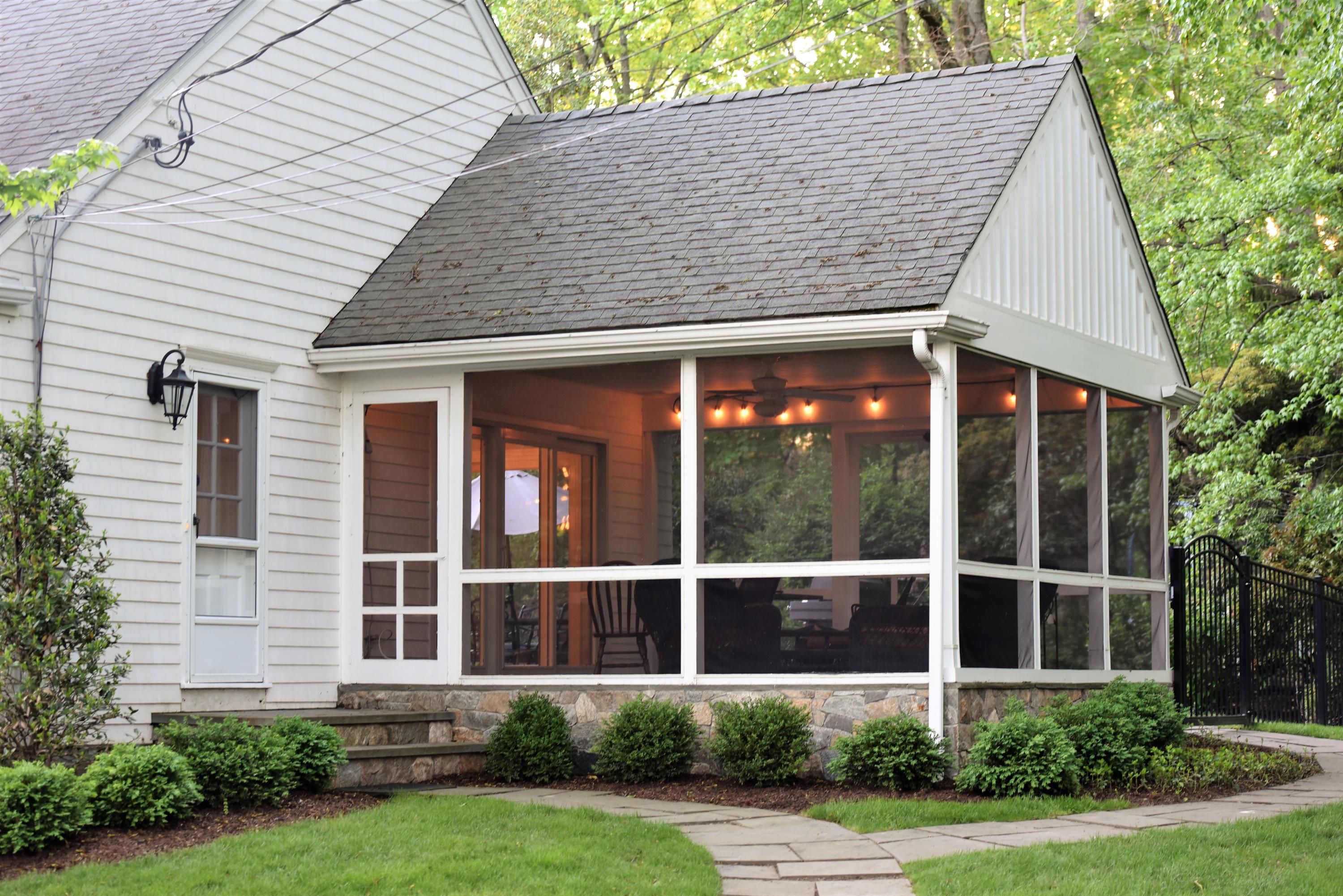 6 Runkenhage Road Darien, CT 06820 - Photo 28 of 32 a front view of a house with a yard