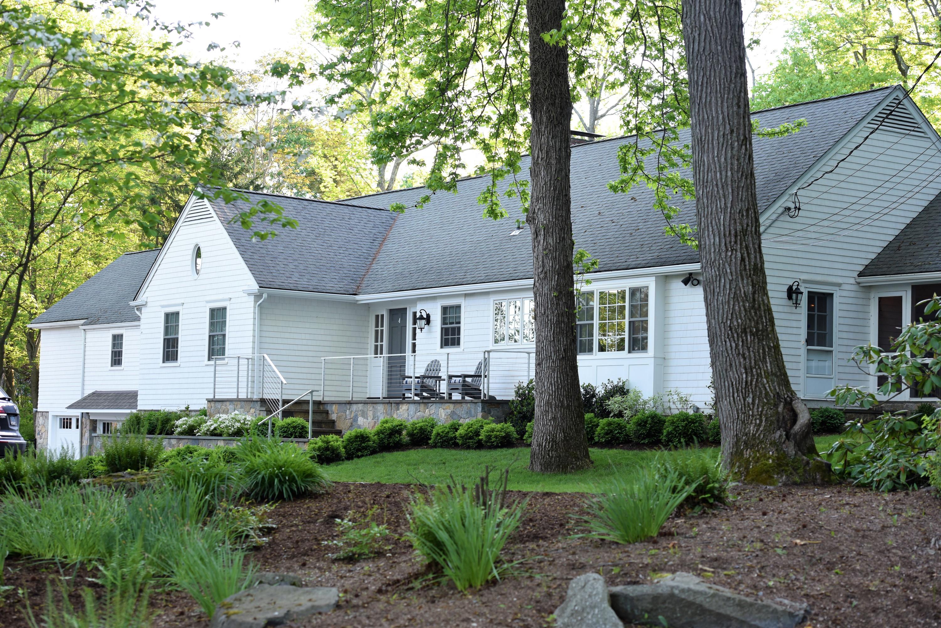 6 Runkenhage Road Darien, CT 06820 - Photo 3 of 32 a view of a yard in front of house