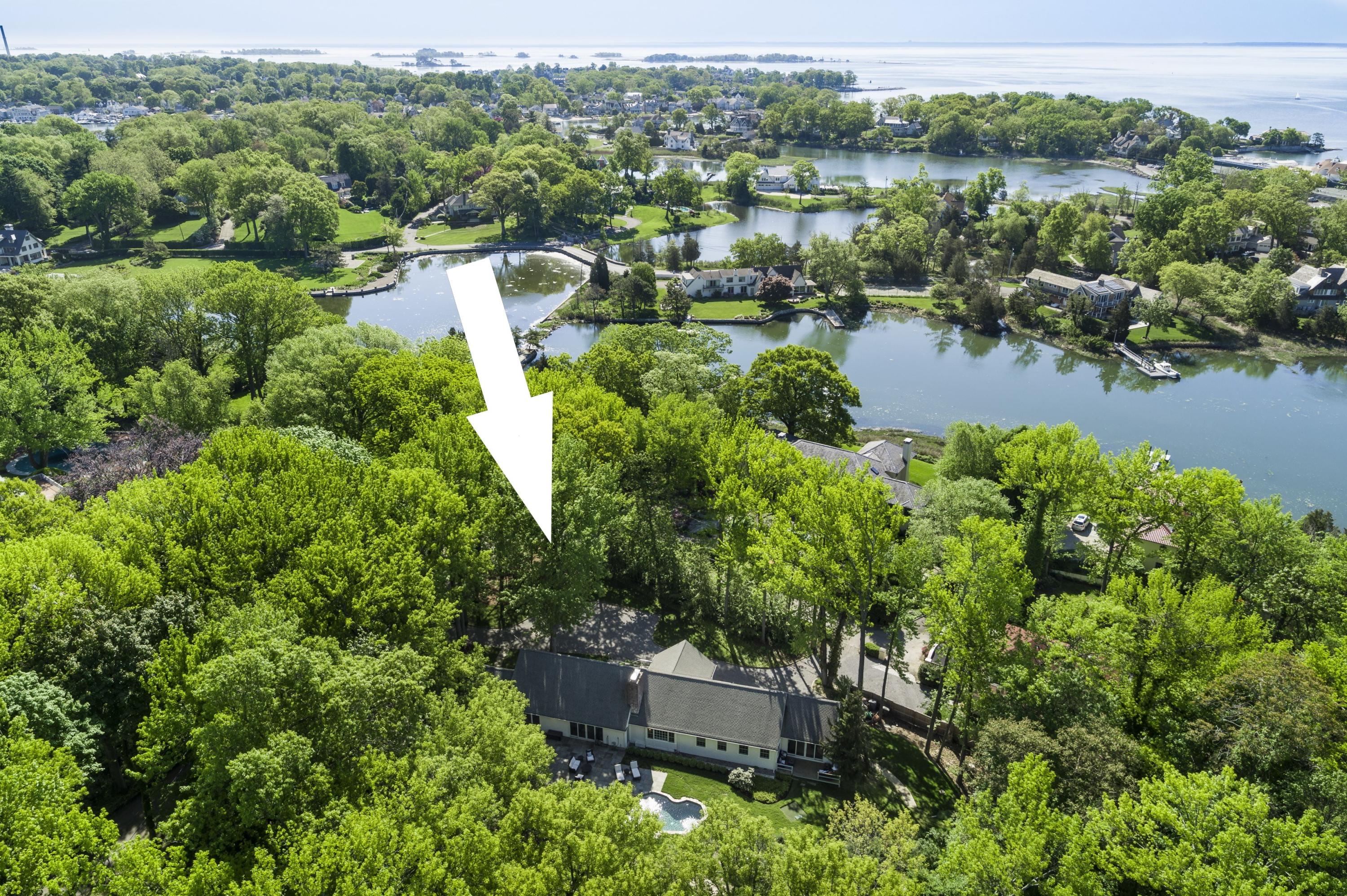 6 Runkenhage Road Darien, CT 06820 - Photo 4 of 32 an aerial view of residential house with outdoor space and lake view