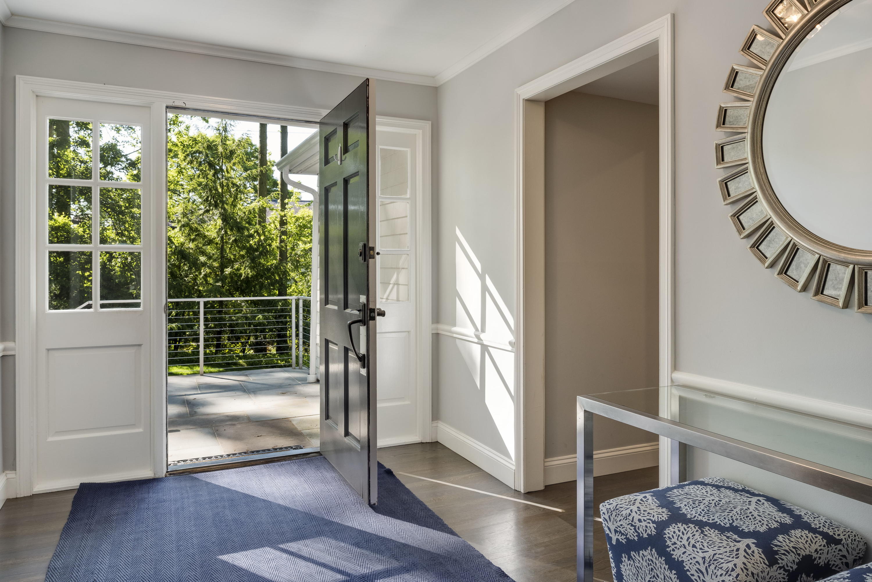 6 Runkenhage Road Darien, CT 06820 - Photo 7 of 32 a view of entryway with wooden floor and a potted plant
